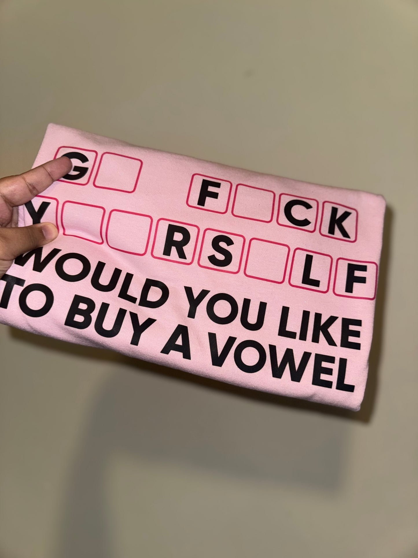 Anybody wanna buy a vowel? Tee