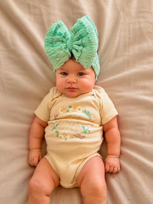 Green ruffle bow