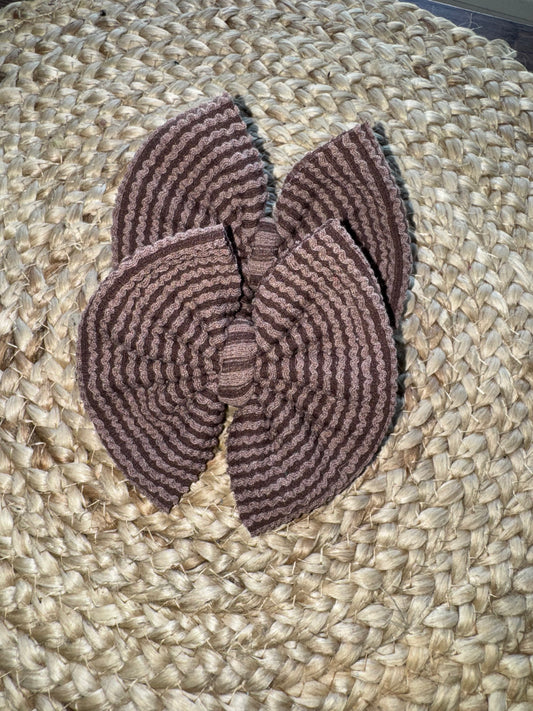 Brown waved bow