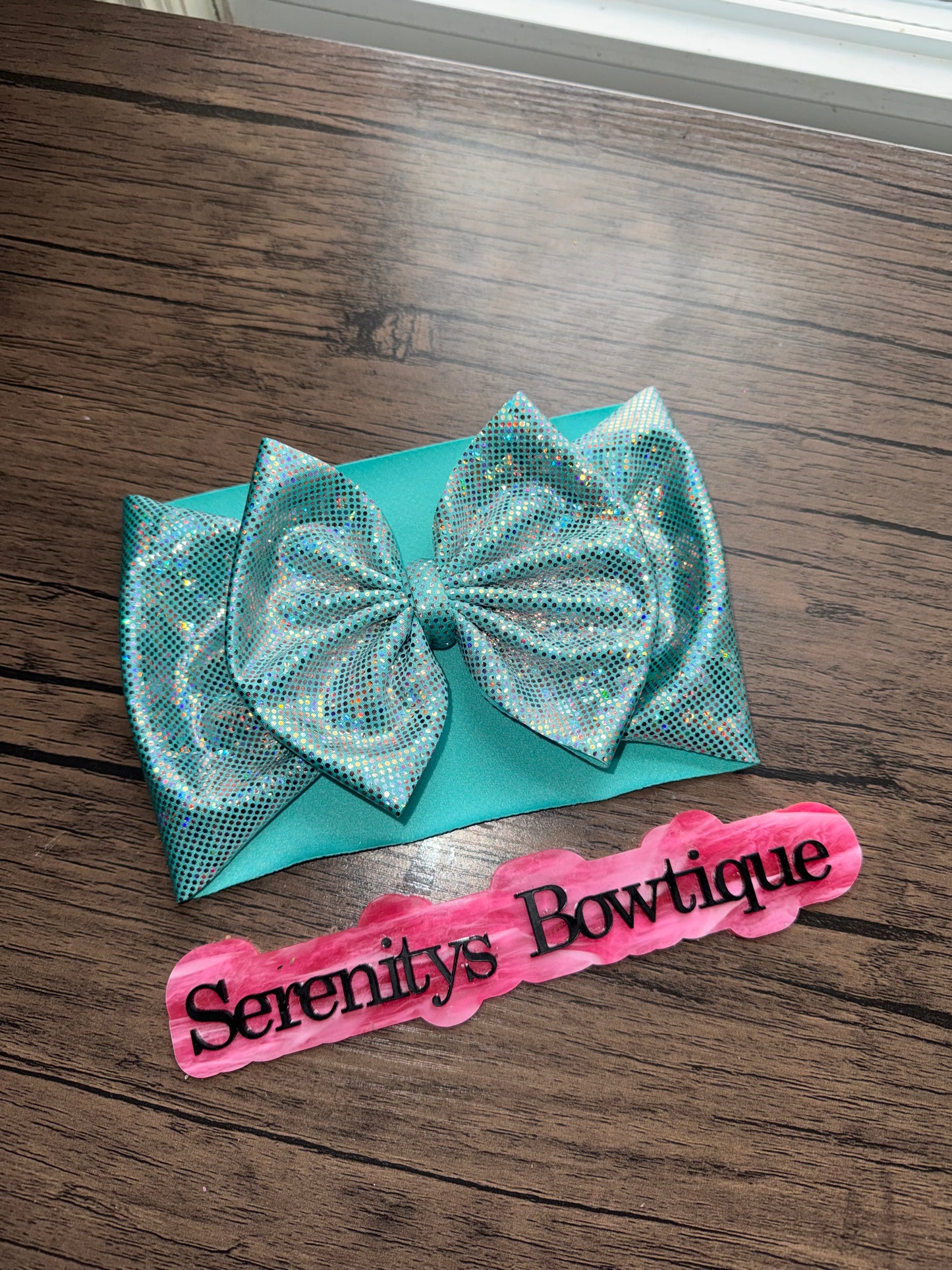 Blue sparkle holo bow