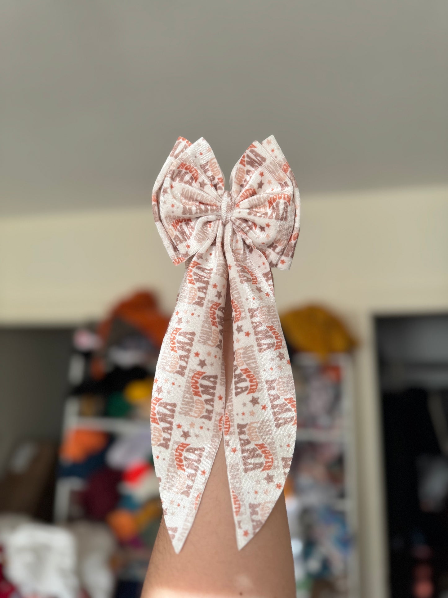 Somebody’s loud mouth mama bow