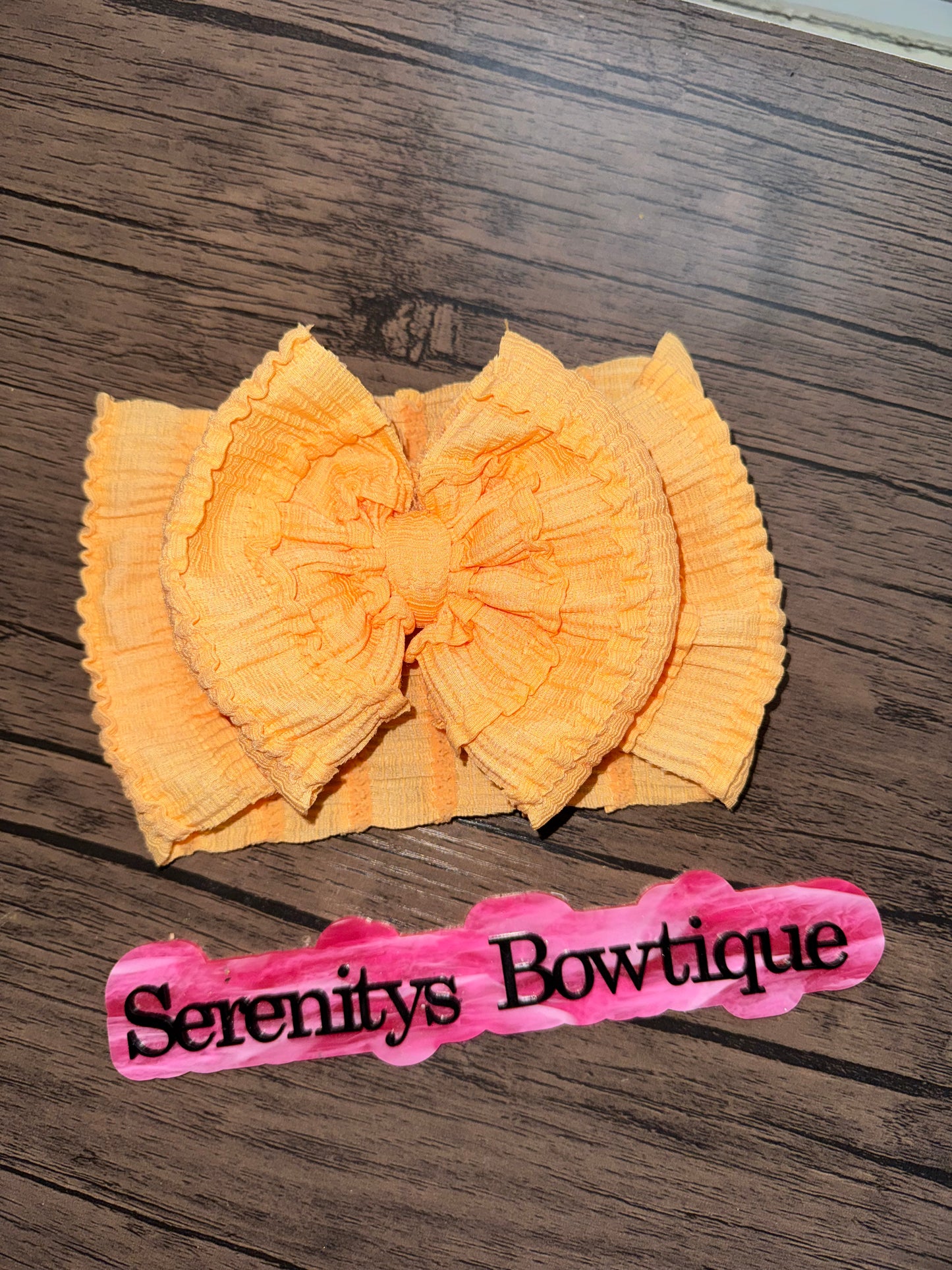 Orange ruffle bow