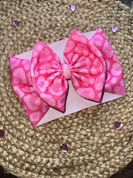 Pink leopard bow