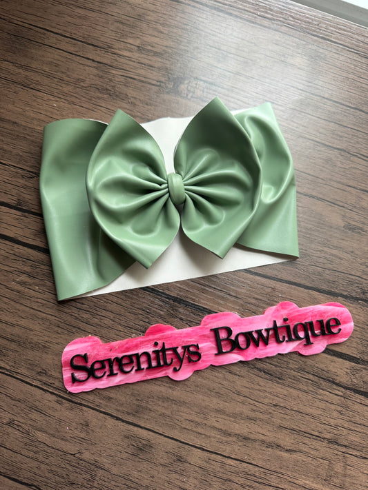 Green pleather bow