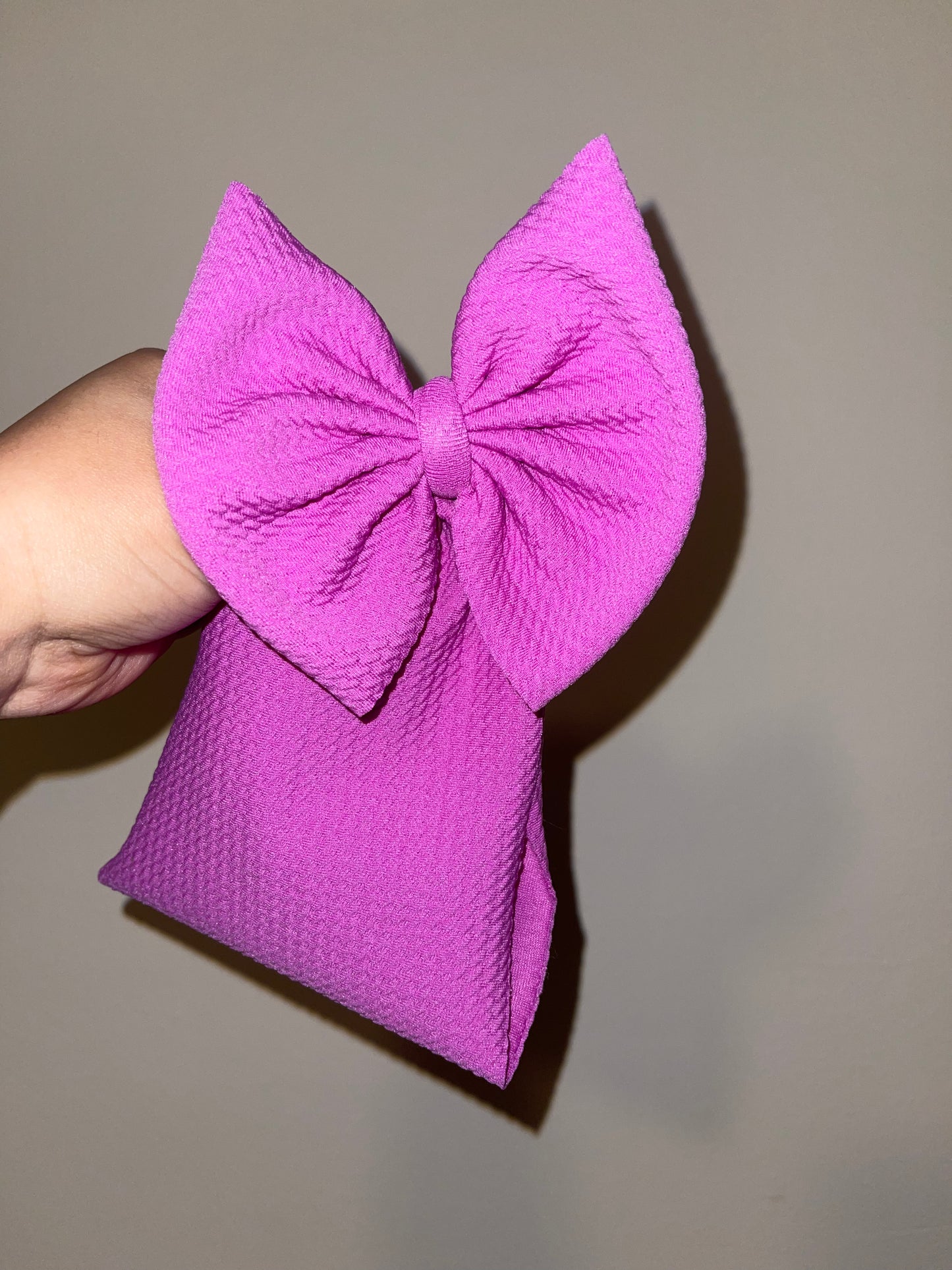 Neon purple bow