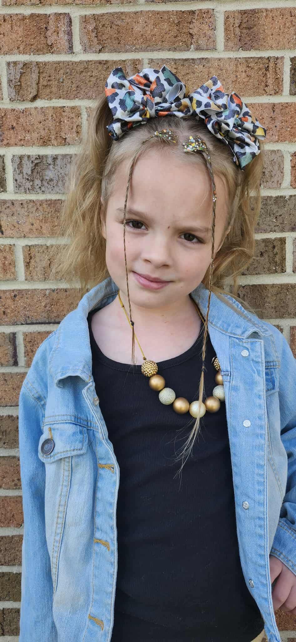 Holographic gemtone cheetah bow