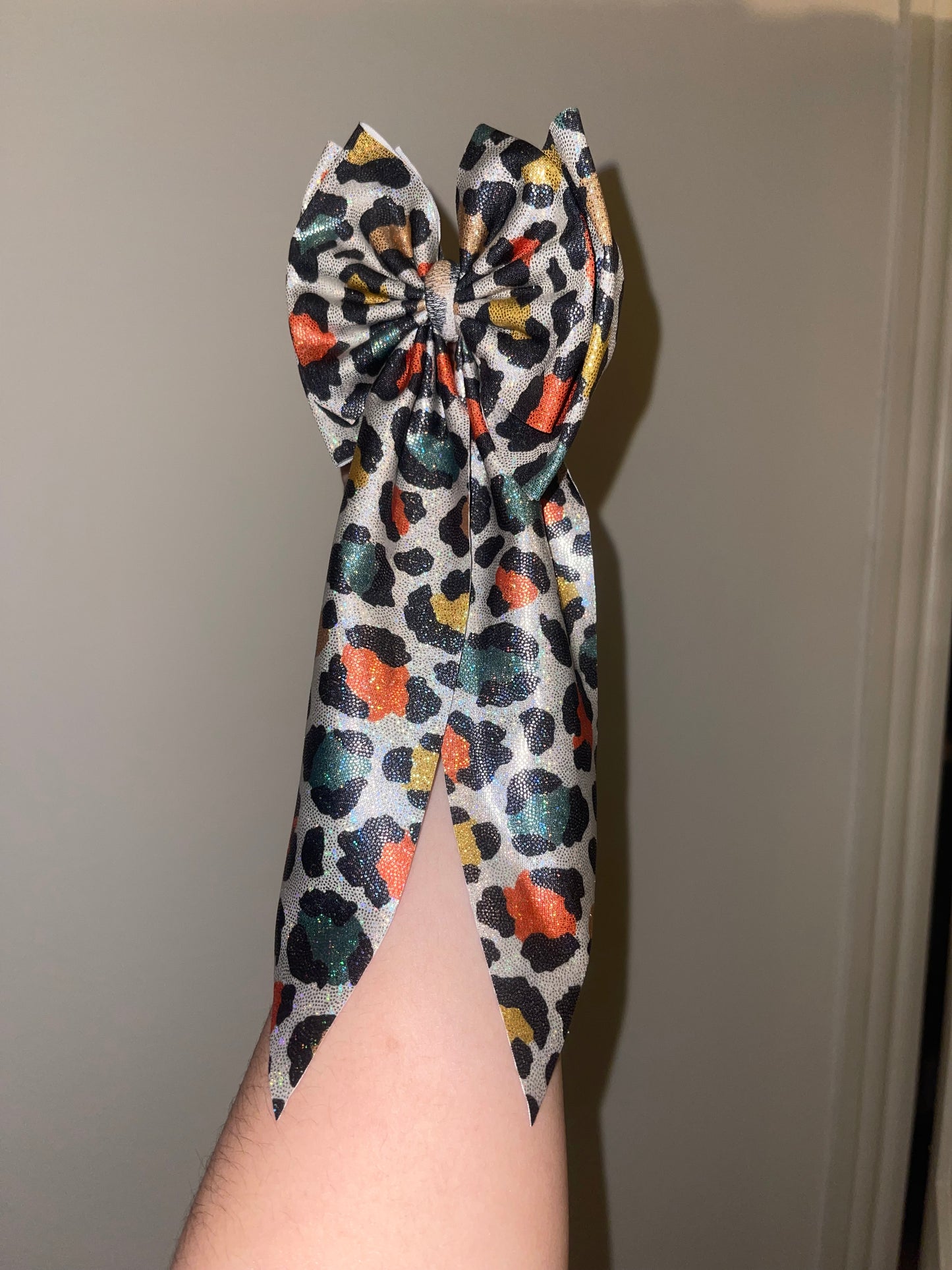 Holographic gemtone cheetah bow