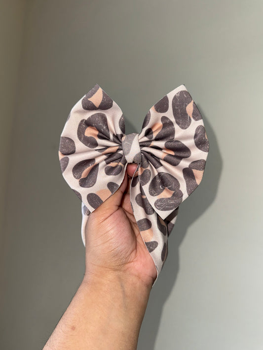 Muted cheetah swim bow