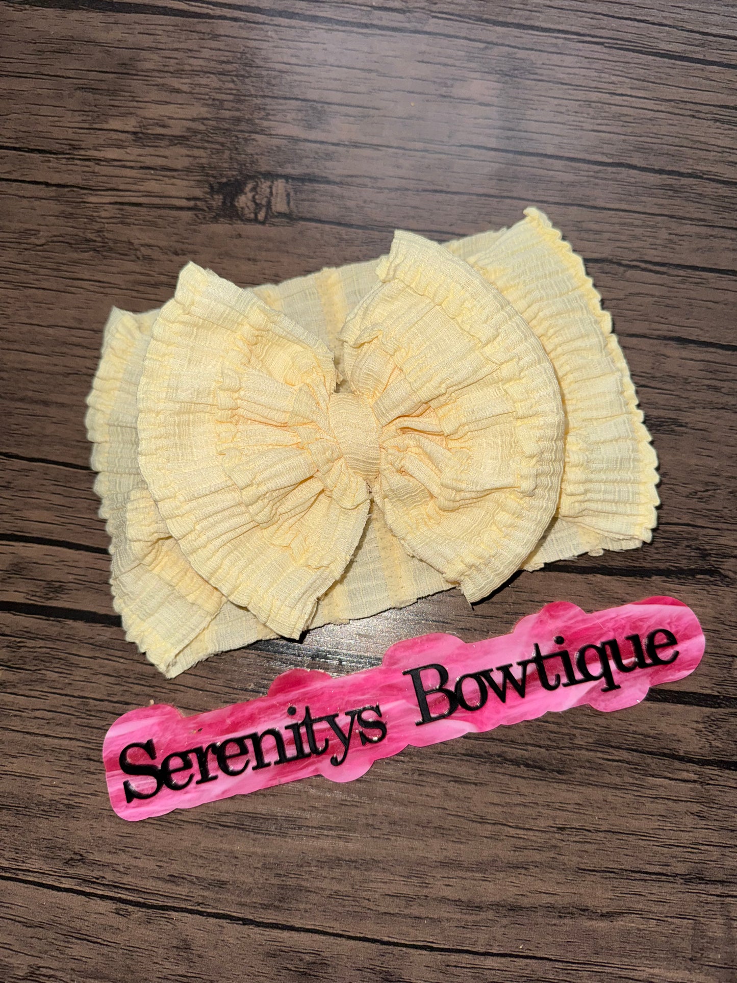 Yellow ruffle bow