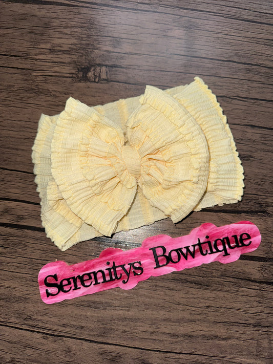 Yellow ruffle bow
