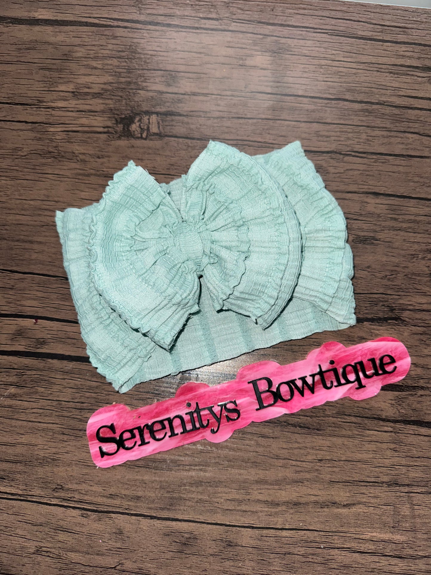 Green ruffle bow