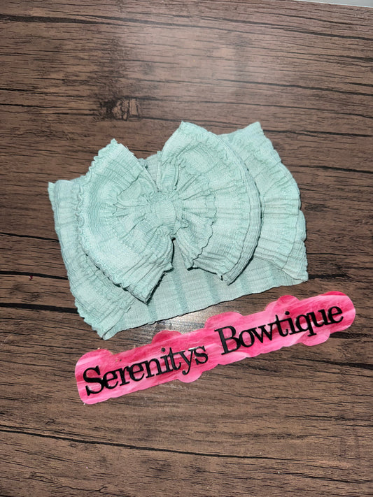 Green ruffle bow