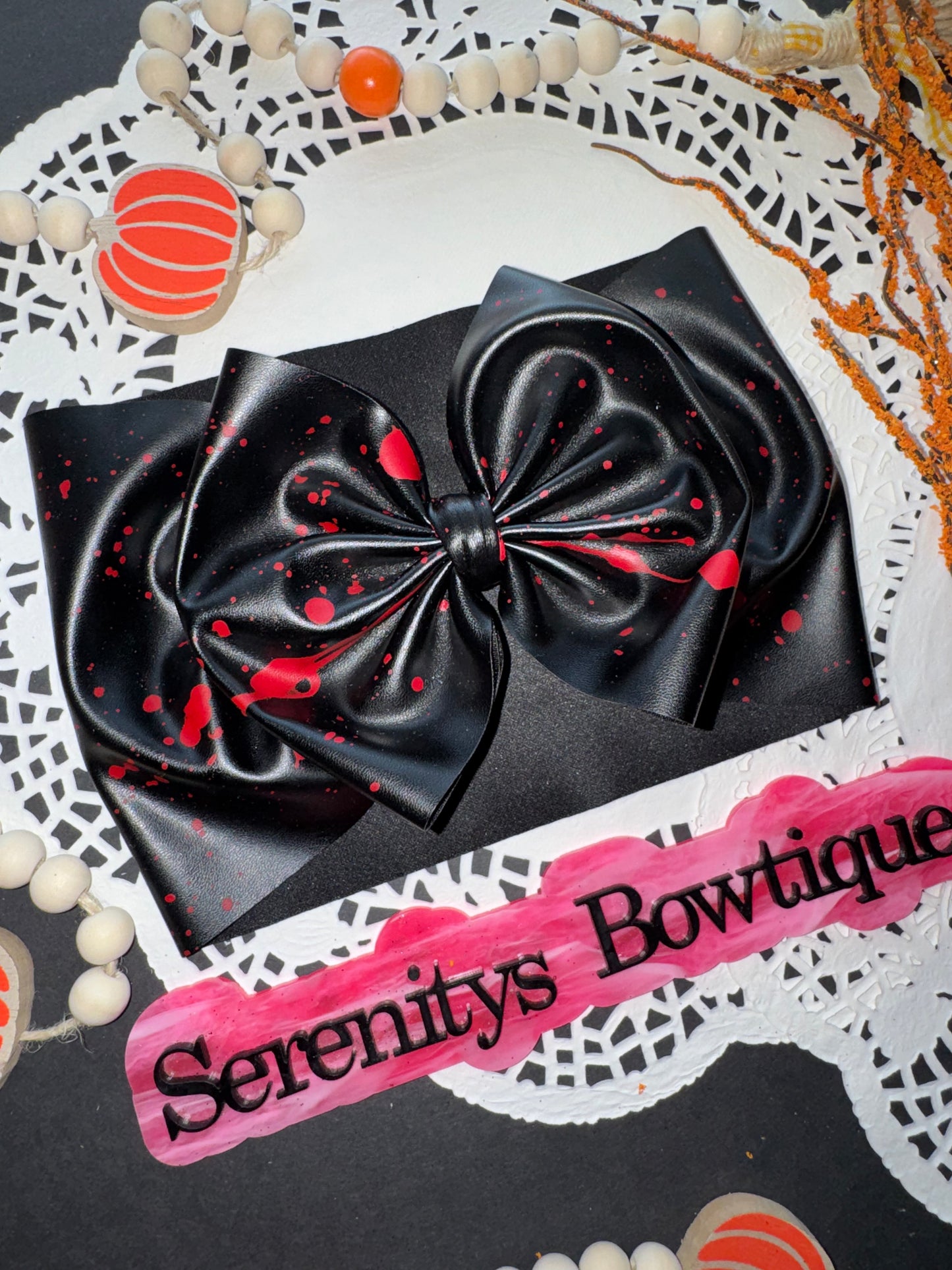 Black pleather bloody bow
