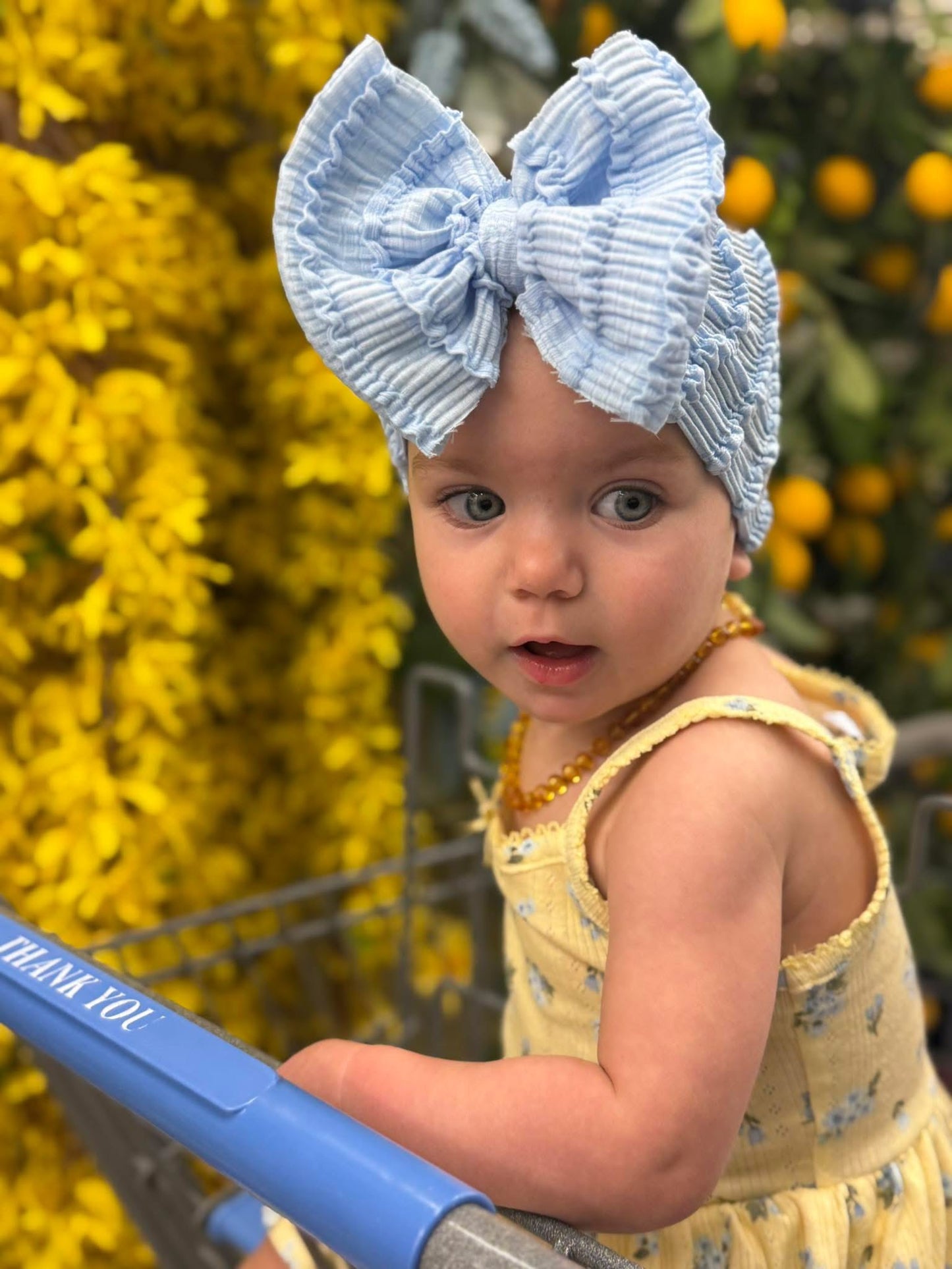 Blue ruffled bow