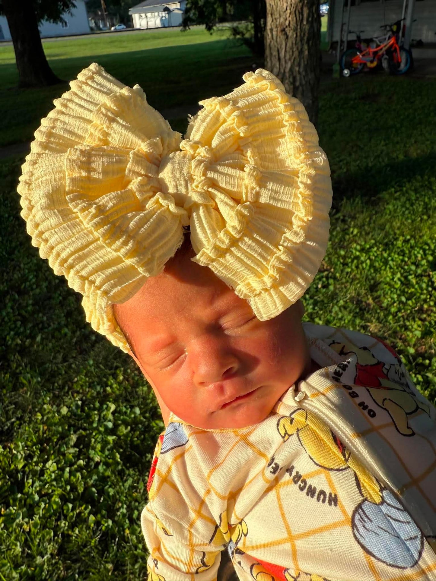 Yellow ruffled bow