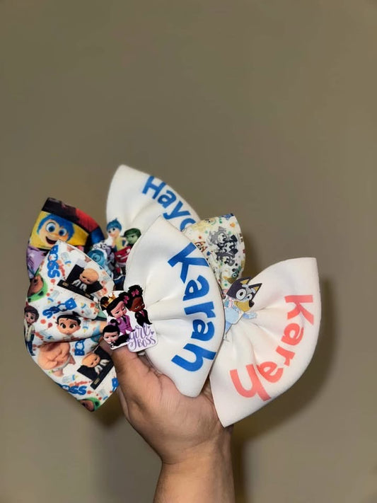 $10 mystery name bow with matching charm