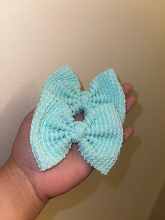 Light blue waved bow