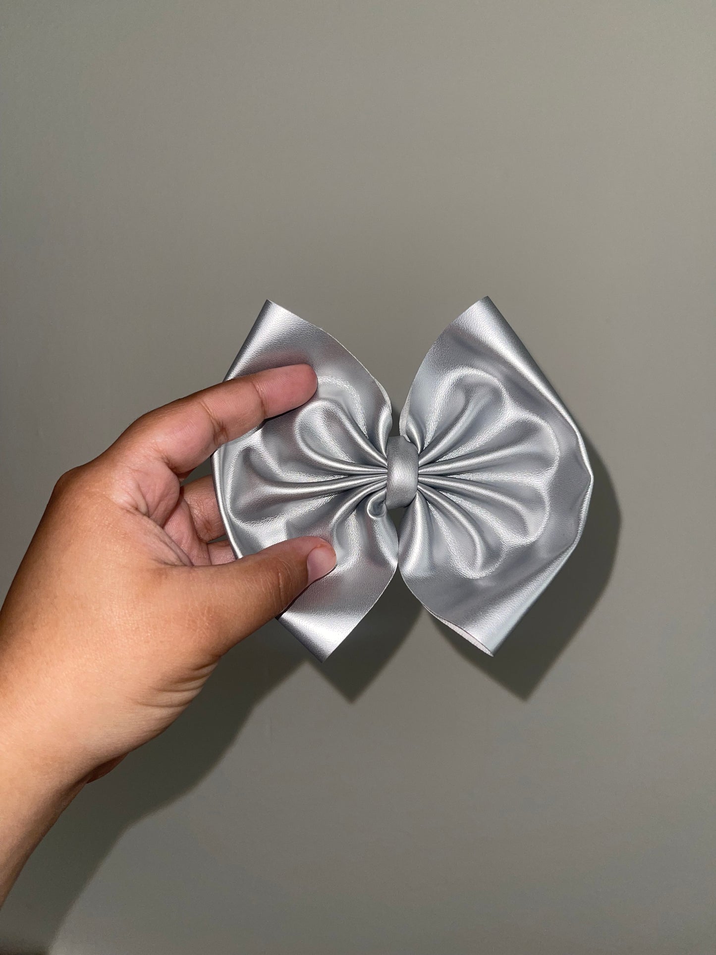 Silver pleather bow