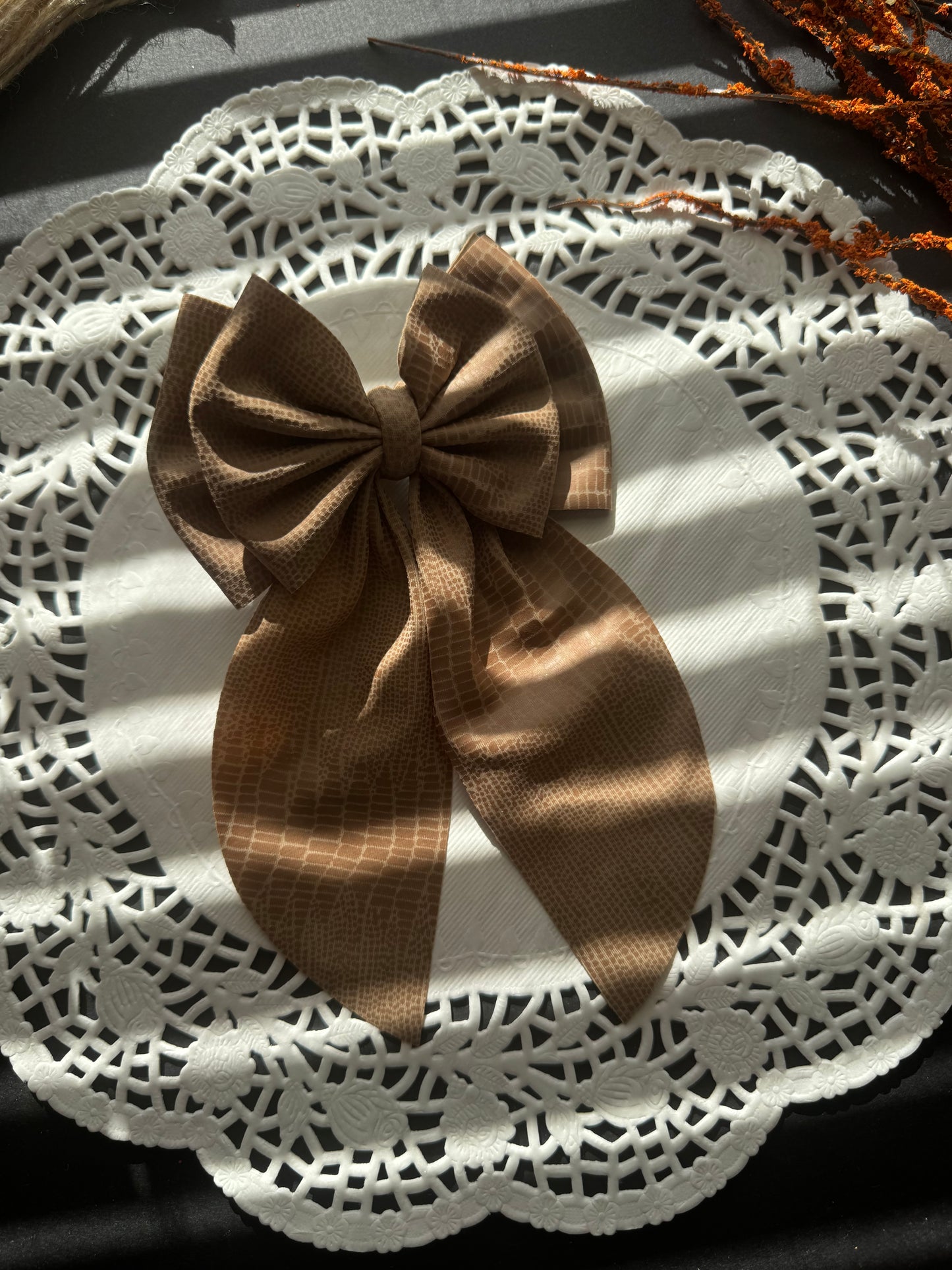 Taupe snake swim bow