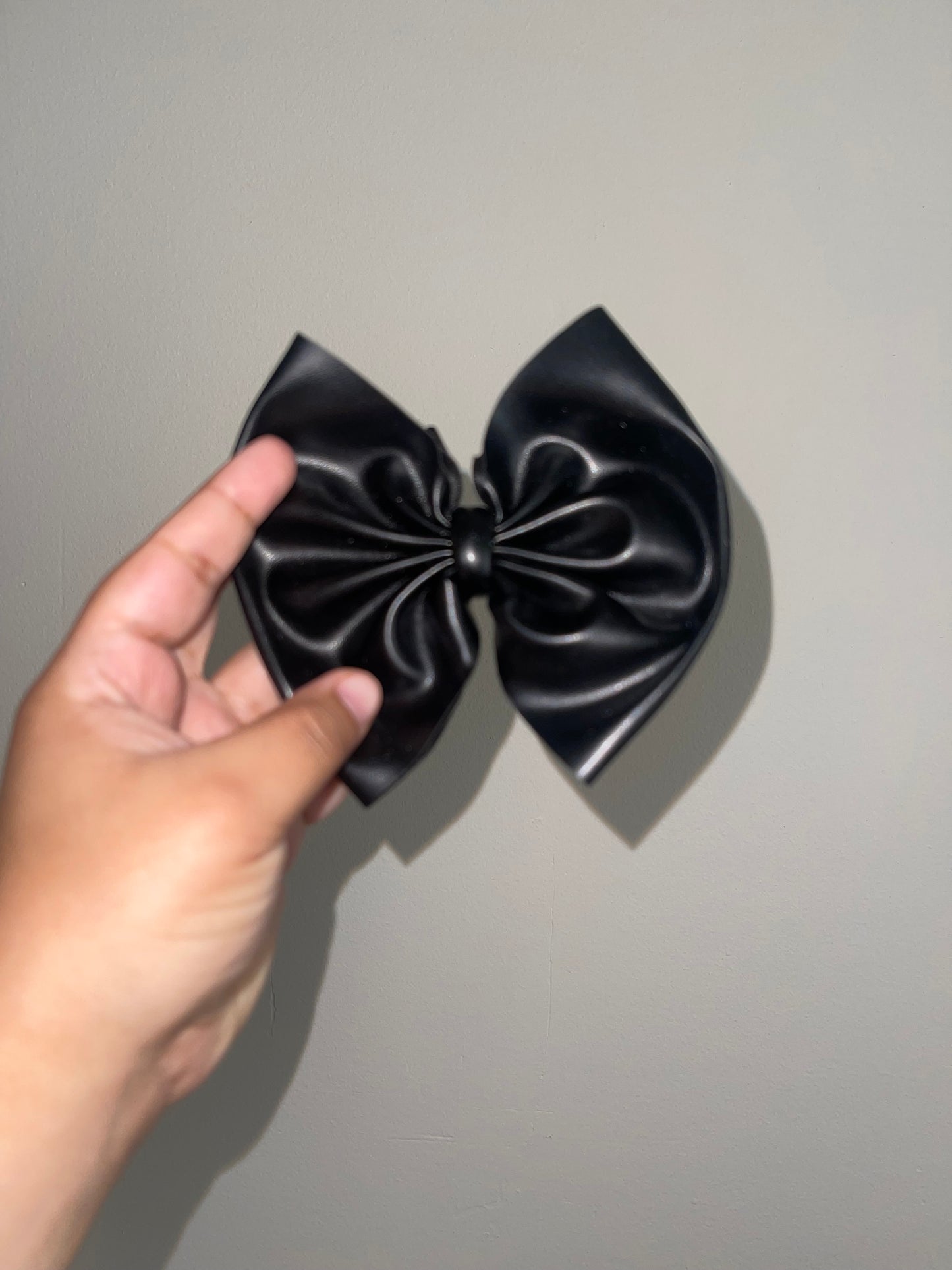 Black pleather bow