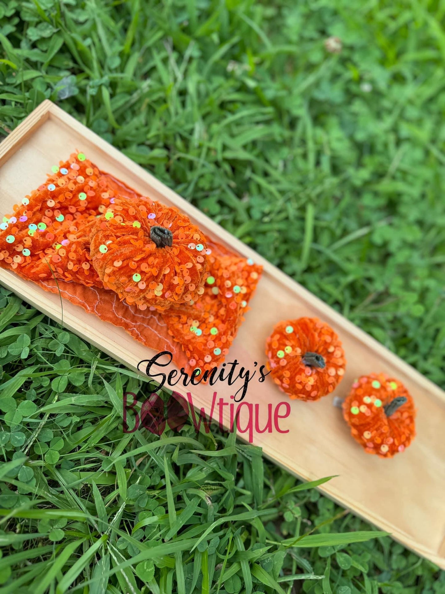 Colorful orange sequins pumpkins