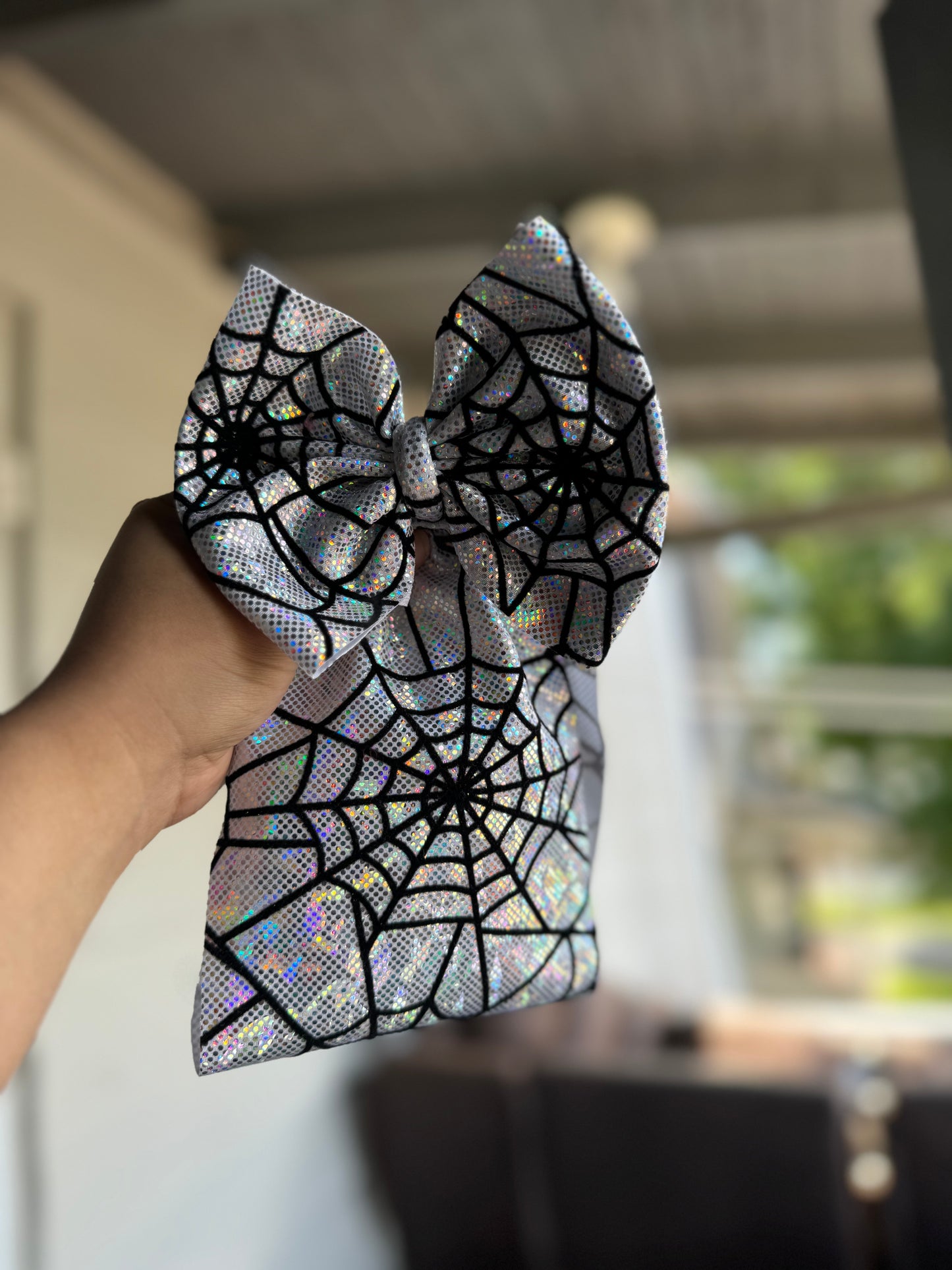 Silver holo spiderweb bow