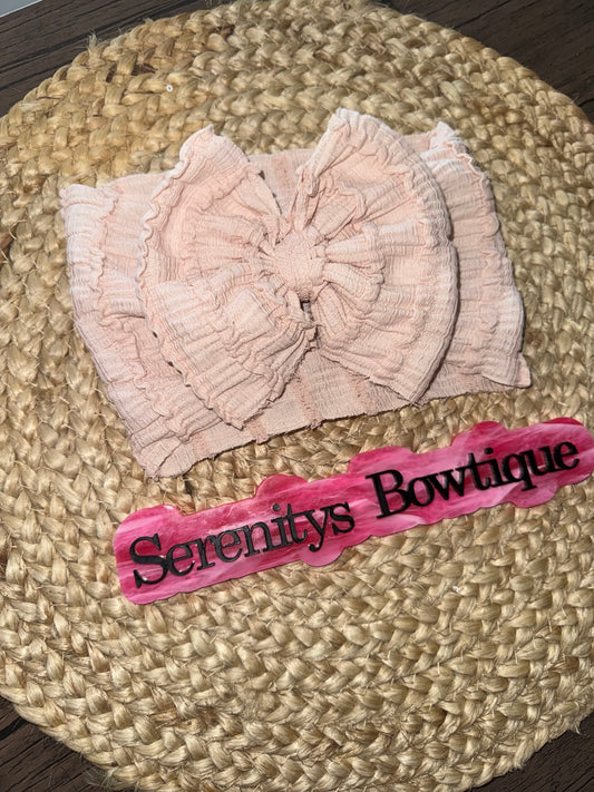 Pinkish tan ruffle bow