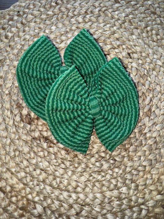 Green waved bow
