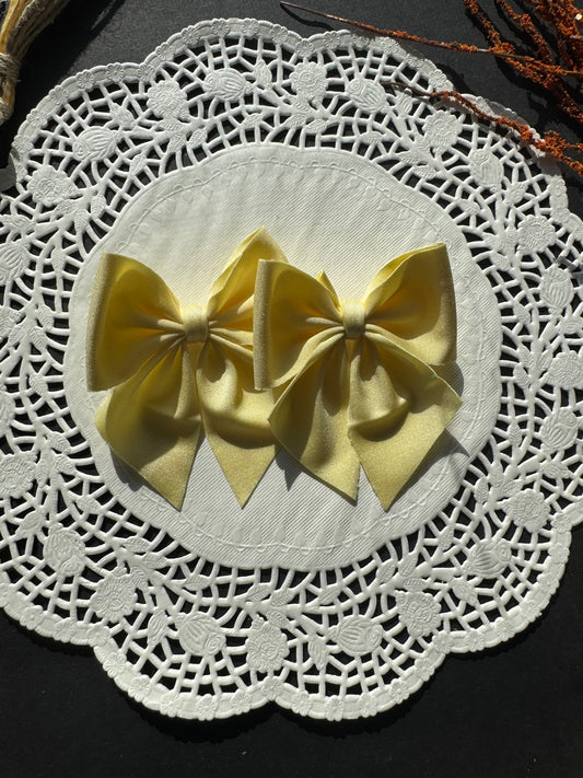 Pastel yellow swim bow