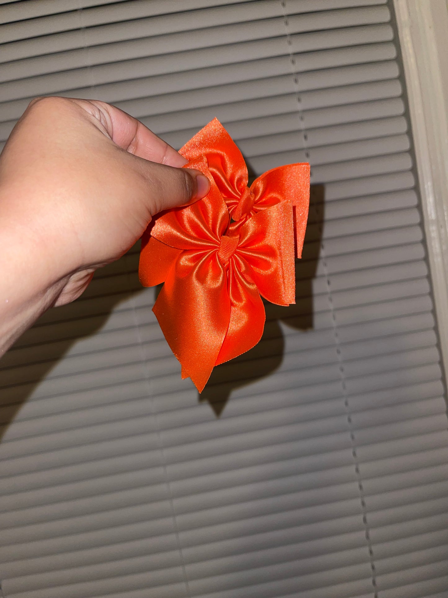 Orange satin bow