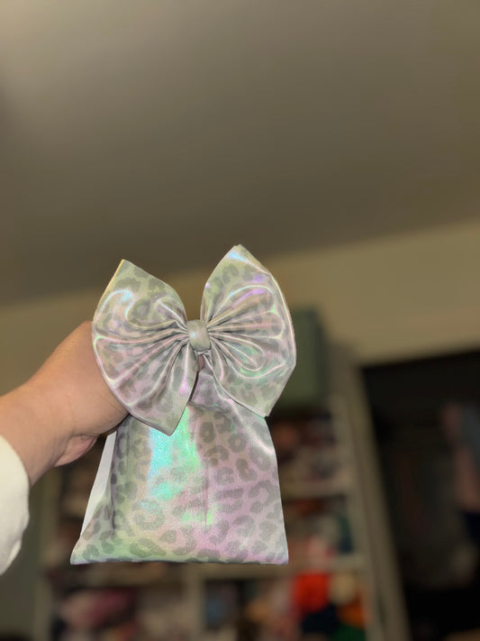 White holo leopard bow