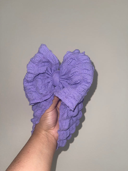 Purple popcorn bow