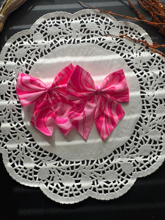 Pink swirl swim bow