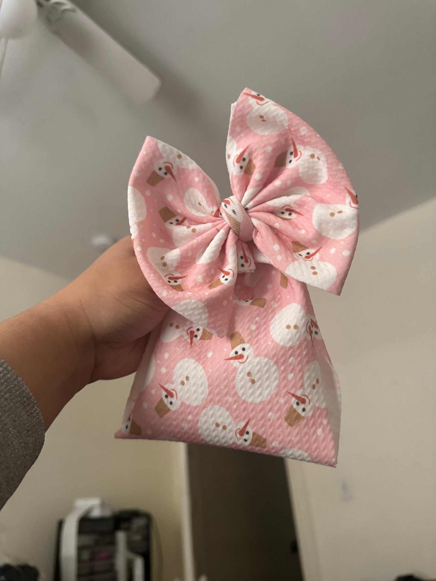 Pink snowman bow