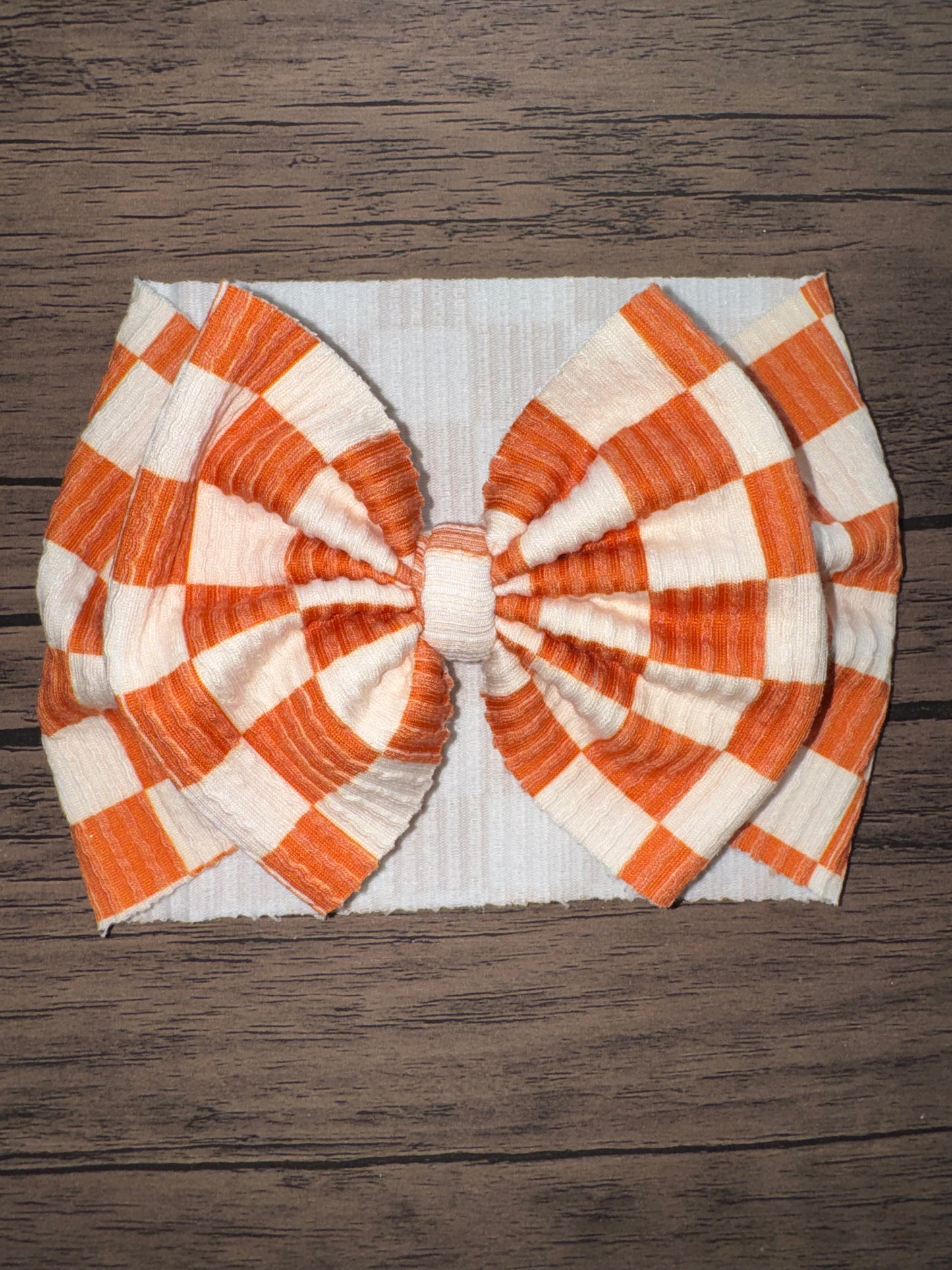Orange checker waved bow